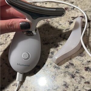 Blumene Facial Massager with Silver and White Design